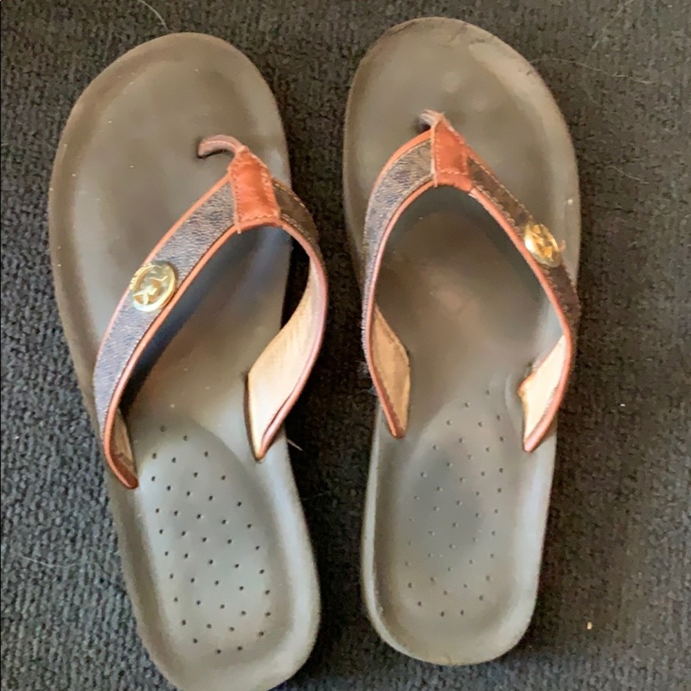 Michael Kors women’s flip flops. Size 7.5